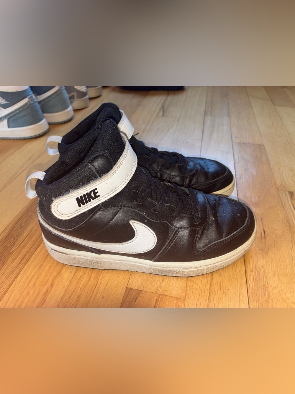 Nike kid’s  Black and White High-Top Sneakers with Straps